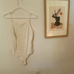 Never worn H & M white/cream bodysuit Size large